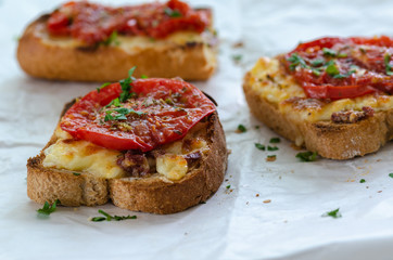 Healthy breakfast at home.Three slices of bread with cheese and tomato
