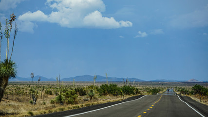 A straight expanse of highway on New Mexico state route 90, north of Lordsburg, south of Silver...