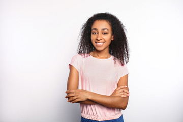 Portrait of beautiful African-American woman on white background