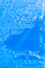 water drops on blue surface