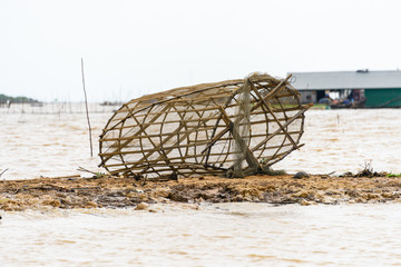 Fishing nets made from bamboo on the bank of the Siem Reap river, Cambodia