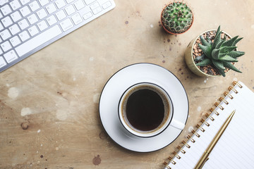 Office desk with hot coffee and plant, Business desk minimal style concept