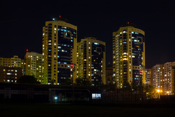 View of the modern district of Moscow Russia with modern buildings and light in the Windows late at night