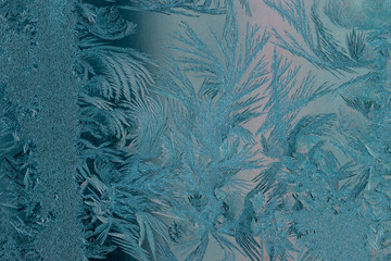 New Year and Christmas abstract icy frost cold weather snowy blue background with real ice crystals...