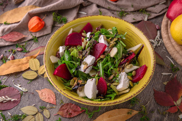 Nutritious, vitamin, healthy salad with beets, lettuce leaves, cheese Rustic Still Life