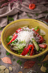 Nutritious, vitamin, healthy salad with beets, lettuce leaves, cheese Rustic Still Life