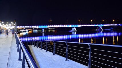 The promenade at the bank of river in night