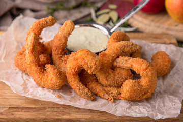 Crunchy Deep fried shrimp in batter with a delicious sauce. Beautiful stylish menu. Autumn still life. Free space for text