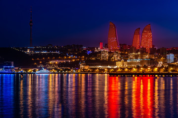 Fototapeta na wymiar Panoramic view of Baku - the capital of Azerbaijan after sunset reflected on the Caspian Sea