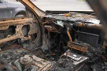 people burned down the car of a man they hated so much