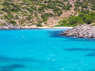 Beautiful beach with turquise water, at Agia (Saint) Dynami (Force) in Chios island, Greece.