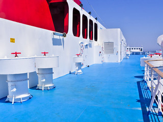 Large ship ferry deck with no people sailing at Aegean sea , Greece, sunny summer day.