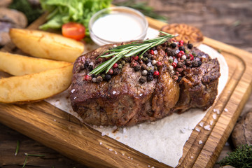 Neck steak, tenderloin or filet mignon pork or beef. Juicy tasty piece of meat. Delicious juicy...