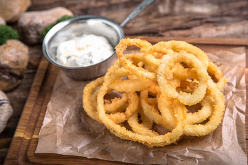 Crunchy Deep fried squid ring in batter with a delicious sauce. Beautiful stylish menu. Autumn...
