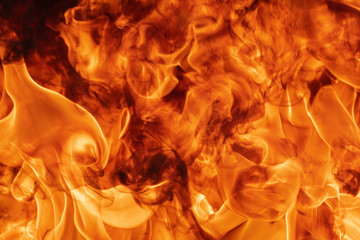 Abstract red fire natural texture with blaze. Beautiful dangerous firestorm abstract background....