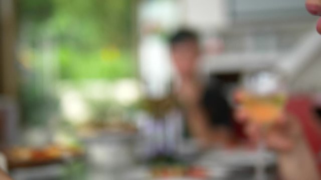 close-up. woman drinking wine at a table at a friendly or family dinner