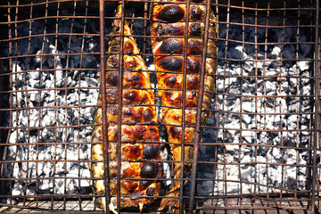 Barbecue mackerel fish on a grill 