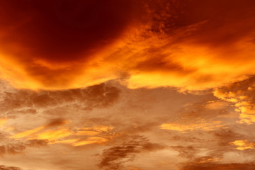 Dramatic sky sunset or sunrise colorful red and orange sky over and cloud beautiful multicolor fiery
