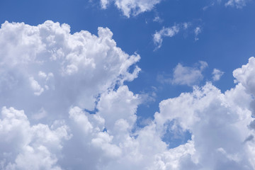 Blue sky and white clouds, rain clouds on sunny summer or spring day.