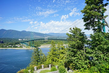 Beautiful Vancouver bay beach and mountain seen from Stanley park