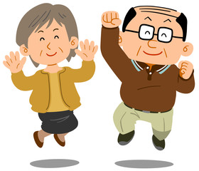ジャンプするシニアの夫婦