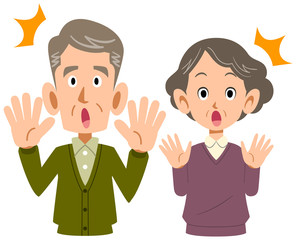 驚くシニアの夫婦