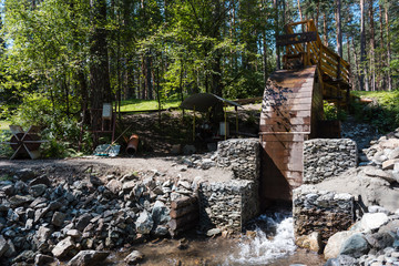 small hydroelectric power station. hydroelectric power station in the mountains. water level...