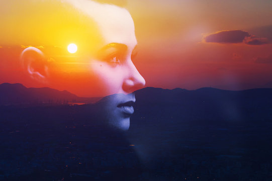 Double multiply exposure abstract dark portrait of a dreamy cute young woman face head silhouette in sky, sunrise or sunset nature. Psychology power of mind, human spirit, mental health, zen concept.