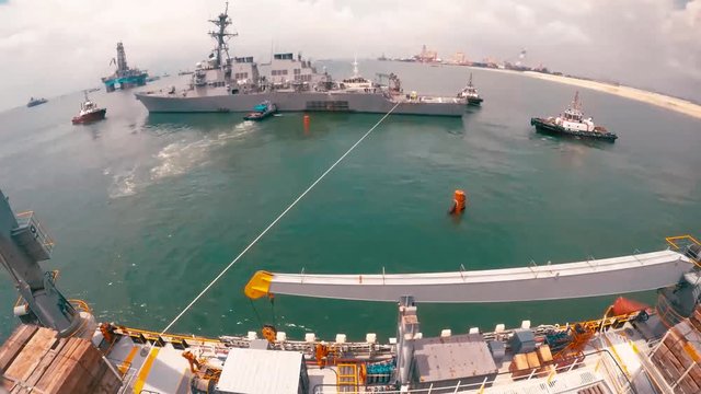 Timelapse Of The USS John S McCain Being Loaded On A Heavy Lift Transport Off The Coast Of Singapore, 2017