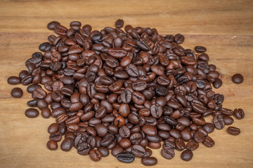 coffee beans on wooden background