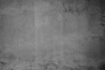 Naklejka premium Art. Czarny betonowy kamień tekstury na tle w kolorze czarnym. Abstrakcyjny kolor sucha porysowana powierzchnia okładka ścienna kolorowy papier zadrapania brudny vintage Cement.