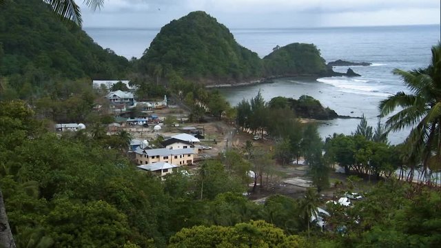 Aftermath of a 2009 tsunami that hit a town in the American Samoa