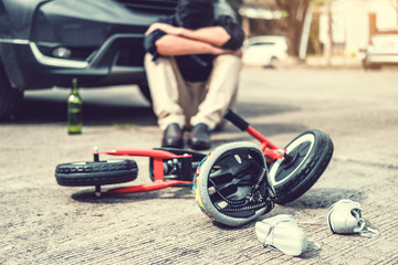 Stressed man suffering after Accident car crash with children's bicycle