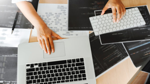 Developing programmer reading computer codes Development Website design and coding technologies.