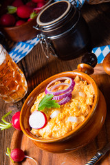 rustic Bavarian obazda with radishes and onions