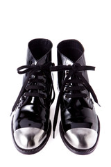 Black fashion boot with metal head on background