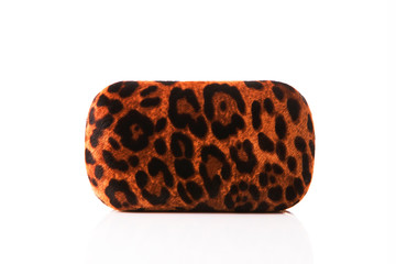 Brown color Tiger stripped  fashion hand bag on background