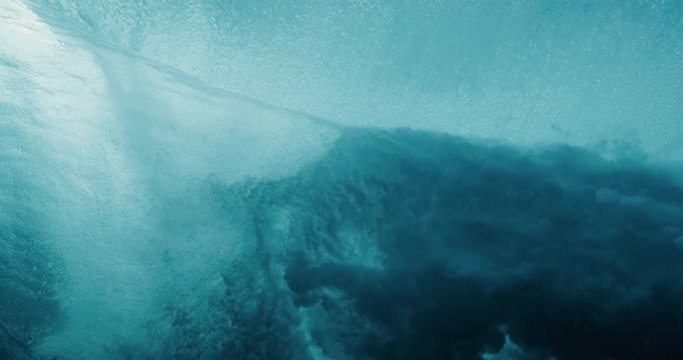 Looking up at a breaking wave from below