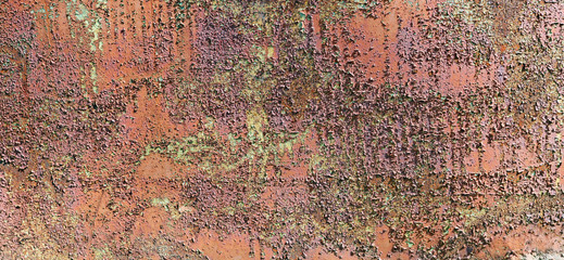 Enamelled  cracked  surface of the the old truck car  door was painted in yellow green and red...