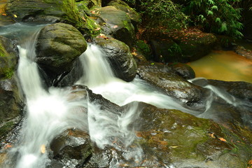Water flowing over rocks at khao ito waterfall,prachin buri city,Thailand.