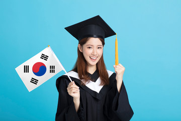 happy Young female graduation student showing the Korea flag