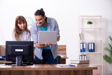 Young male it specialist in the office