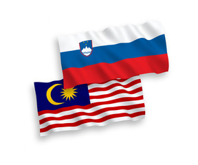 Flags of Slovenia and Malaysia on a white background