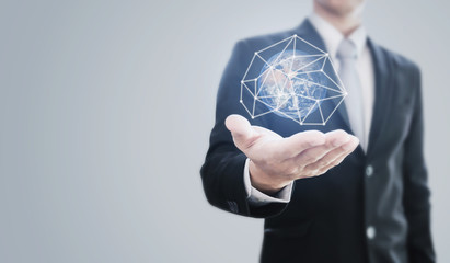 Businessman holding global networking. Global business and protecting the world. Element of this image are furnished by NASA 
