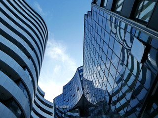 Buildings reflected In another building - glass architecture