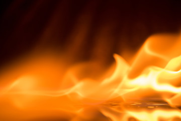 Fototapeta premium Fire flames on a black background
