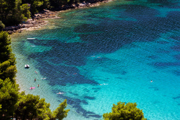 People enjoying summer on Vucine beach - Peljesac peninsula, Croatia