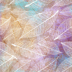 Autumnal skeleton leaves  seamless pattern on a grunge artistic background.