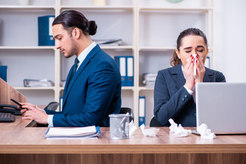 Two employees suffering at workplace
