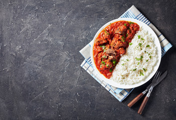 Beef Stew with rice on a plate